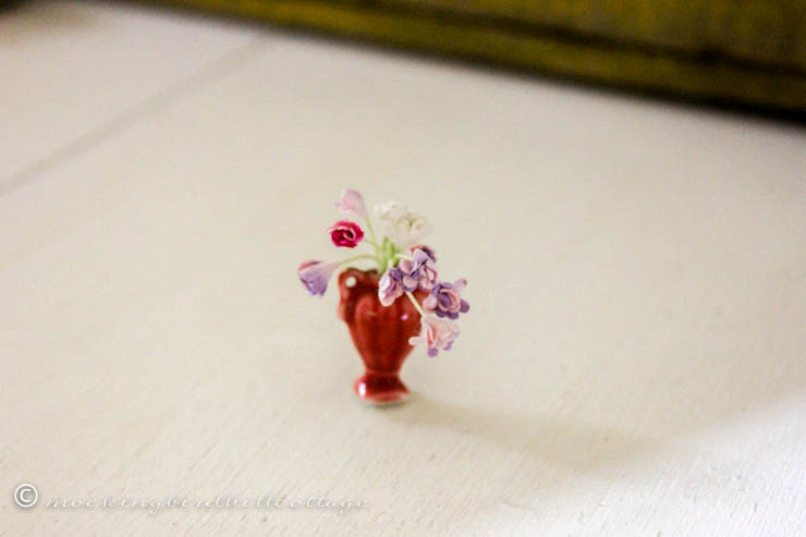 min vase with smaller flowers
